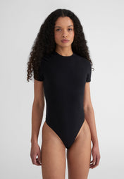 Woman wearing Fitted Shortsleeve  Bodysuit - black