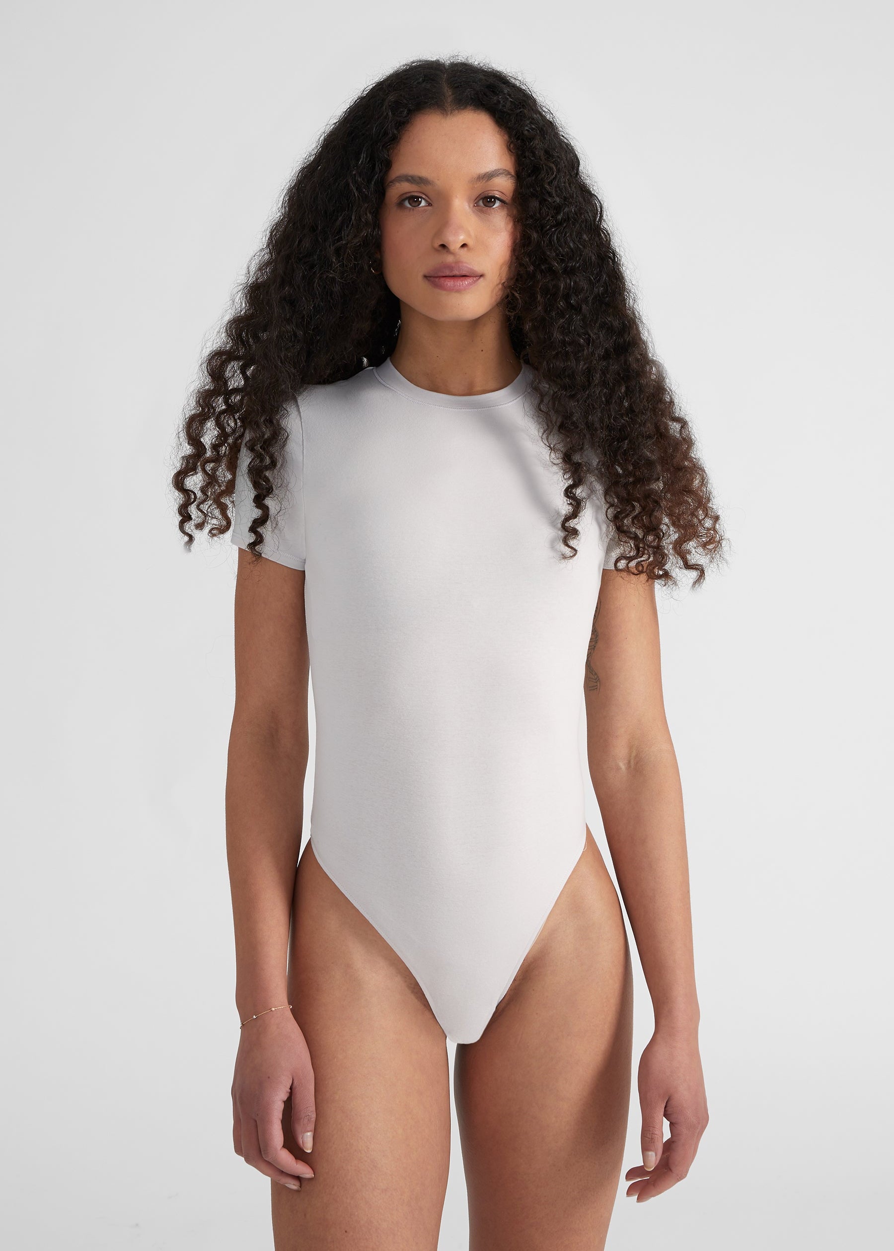 Woman wearing Fitted Shortsleeve  Bodysuit - light grey 