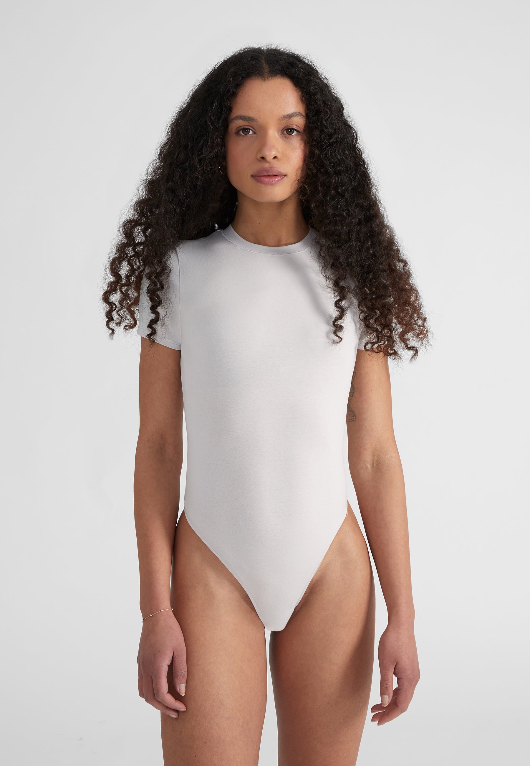 Woman wearing Fitted Shortsleeve  Bodysuit - light grey melange 