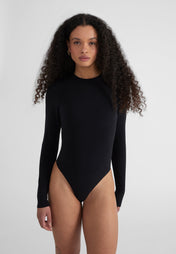 Woman wearing Fitted Longsleeve Bodysuit - black