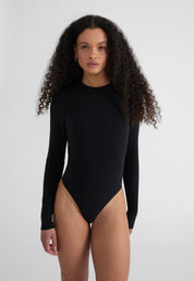 Woman wearing Fitted Longsleeve Bodysuit - black