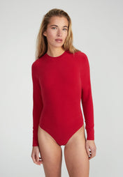 Woman wearing Fitted Longsleeve Bodysuit -wine