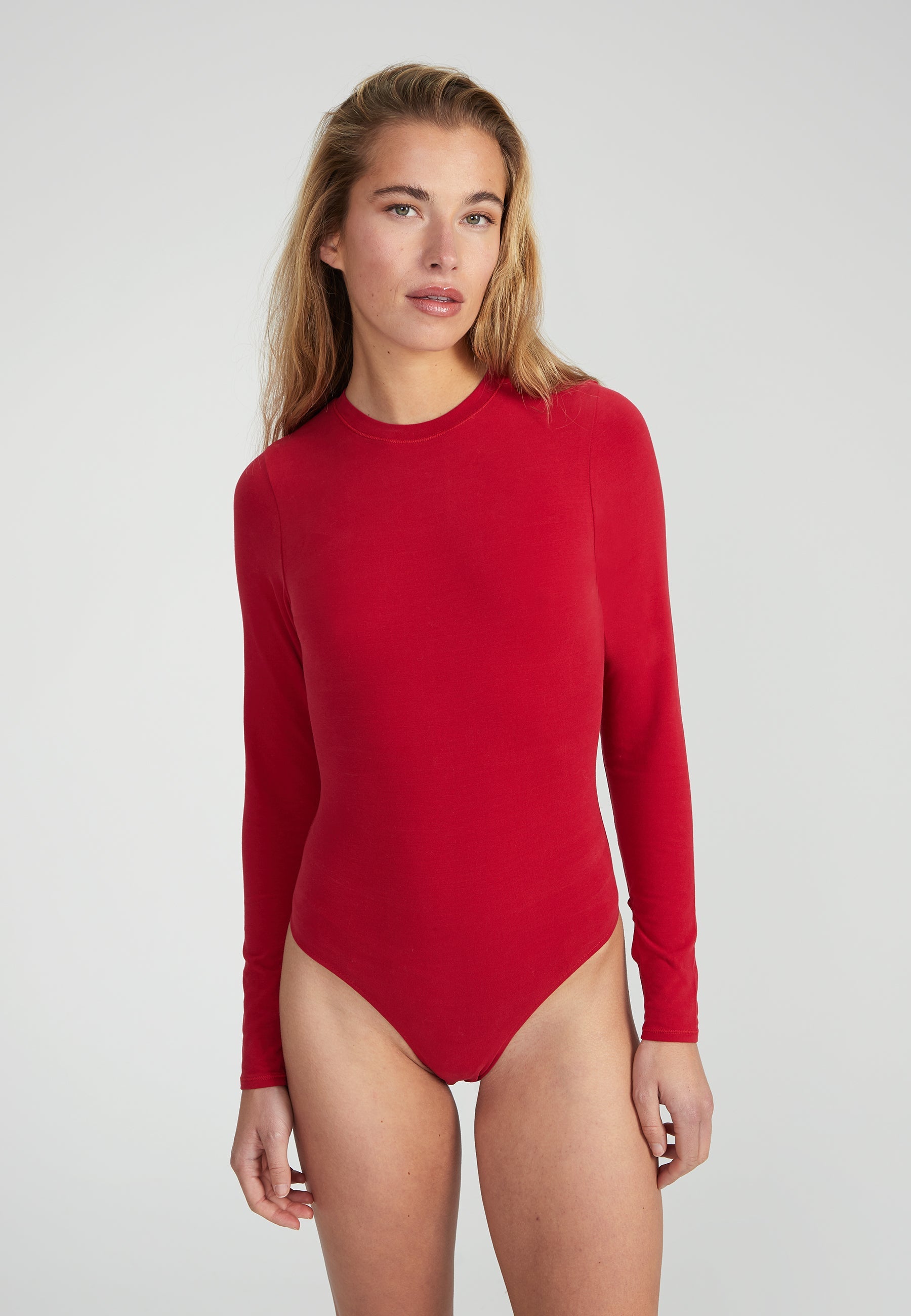 Woman wearing Fitted Longsleeve Bodysuit -wine